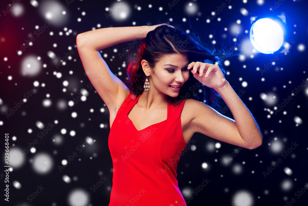 beautiful sexy woman in red dancing at nightclub beautiful sexy woman in red dancing at nightclub