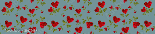  panorama red heart rose petals on a stalk of green leaves