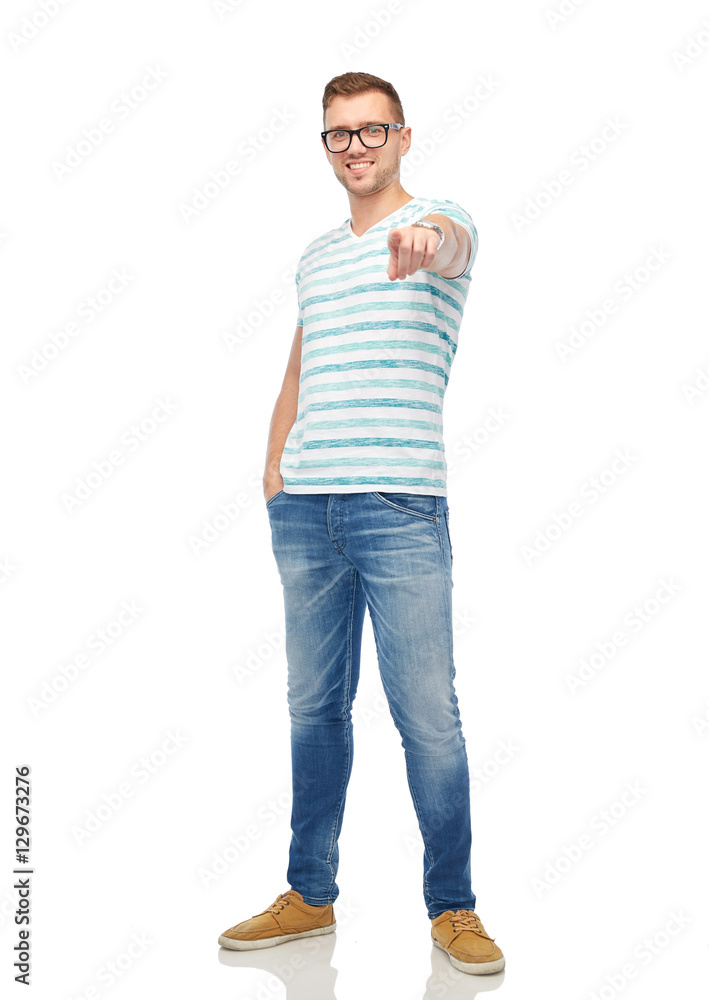 smiling man in eyeglasses pointing finger to you smiling man in eyeglasses pointing finger to you