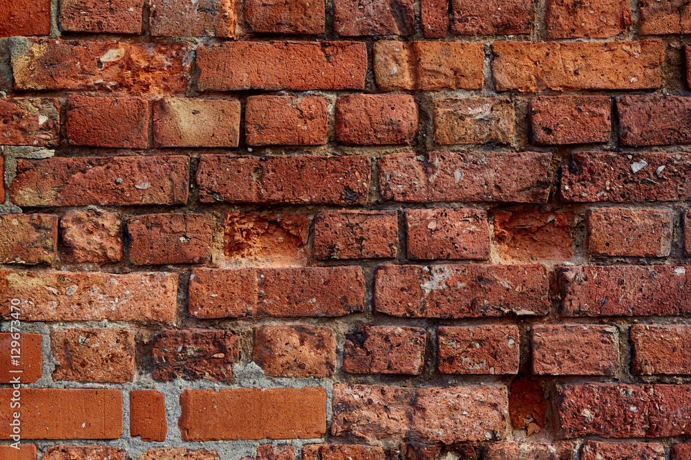 Obraz premium 100 years old brick wall that gives you a great background