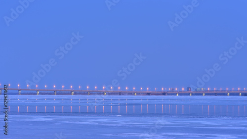 beautiful winter landscape with a view of the bridge