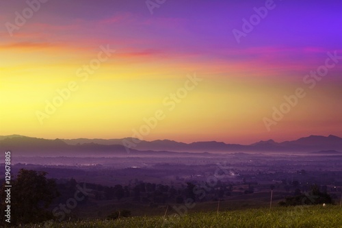Sunset with silhouetted mountains at Moon  Colorful Style
