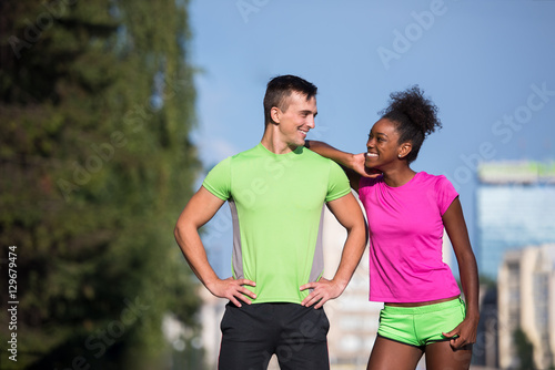portrait of young multietnic jogging couple ready to run