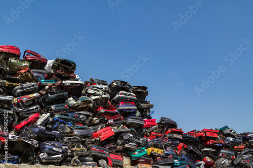 Stacked cars at a junkyard in Amsterdam photo