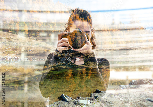 Double exposure of girl taking picture and autumnal mountainscape