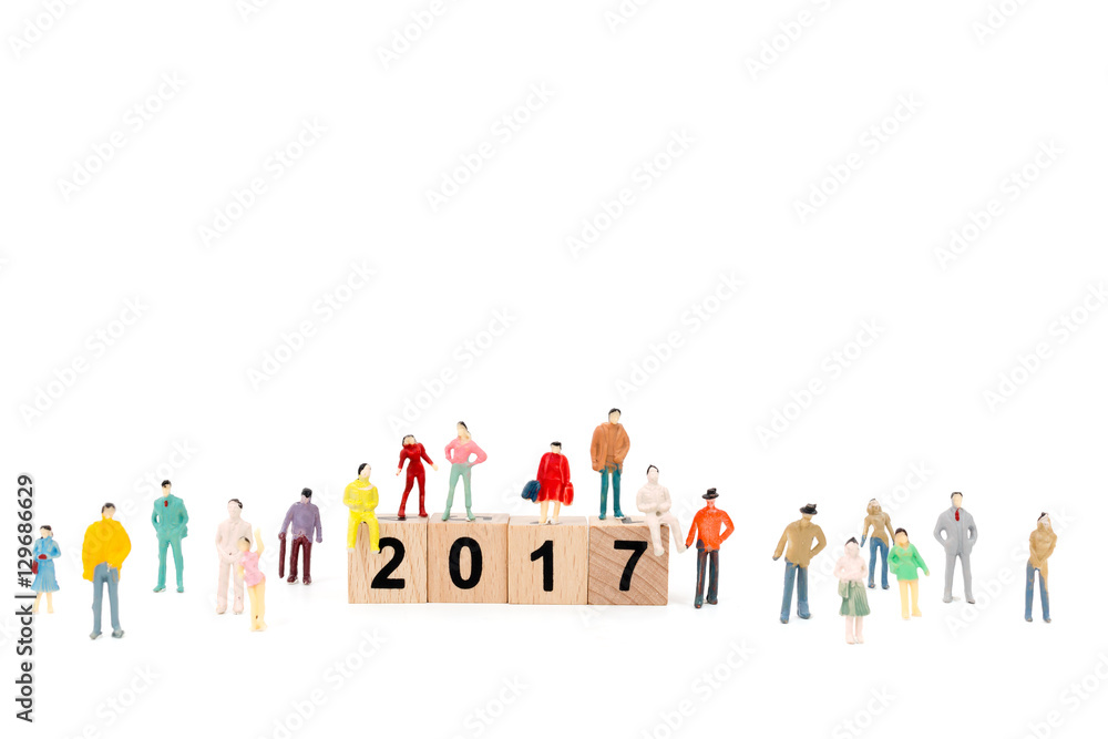 Crowd of people with Wooden block Word 2017  on white background