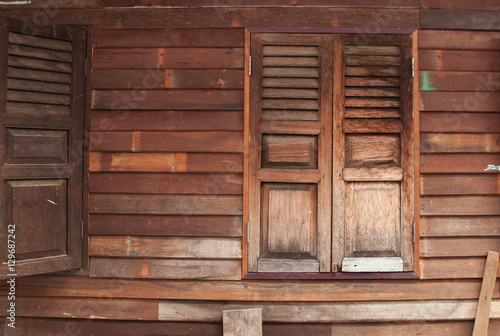 Wooden window and plank wall background