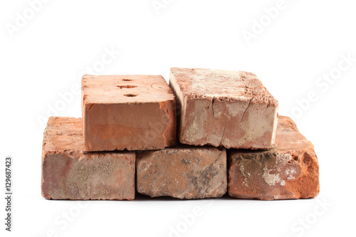 Old red brick isolated on white 