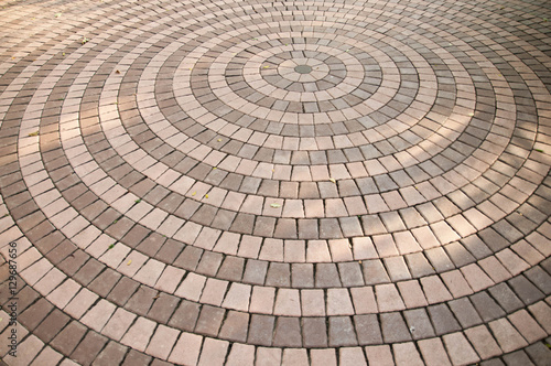 Concrete paving blocks, sorted into circle.
