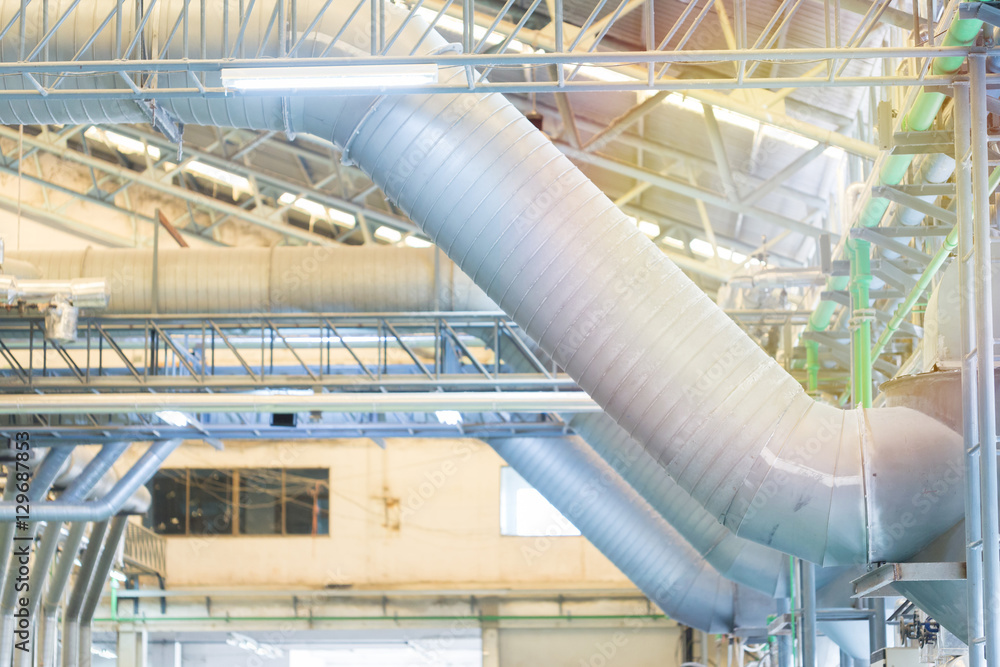 Pipes and ventilation ducts in large industrial plants.