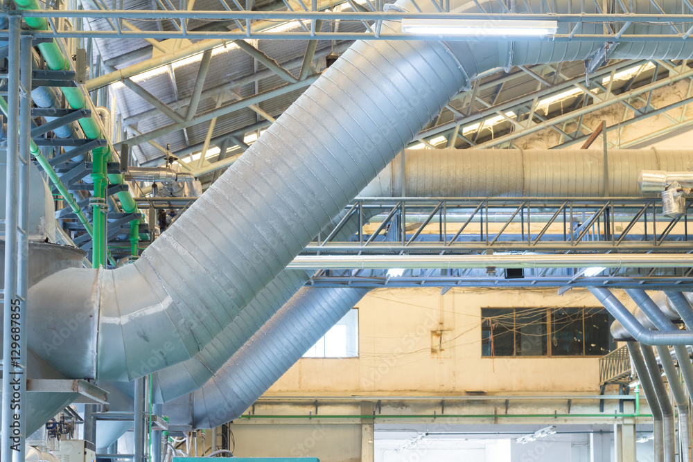 Pipes and ventilation ducts in large industrial plants.