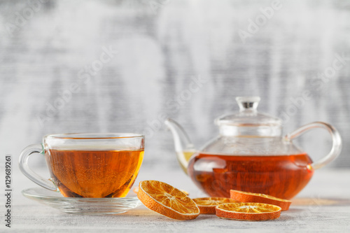 DIY winter composition with dried orange, tea glass