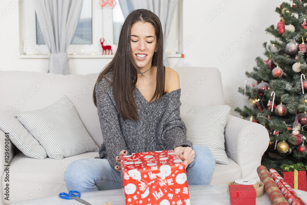 Happy beautiful Women Wrapping Christmas gifts Happy beautiful Women Wrapping Christmas gifts