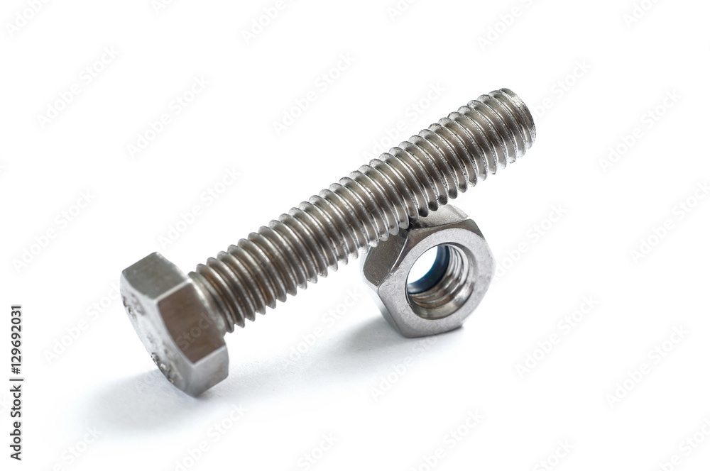 a nut with steel screw on top isolated a nut with steel screw on top isolated