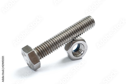 a nut with steel screw on top isolated