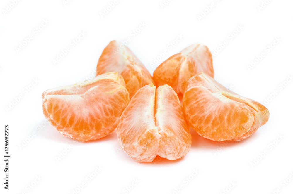 Pieces of orange tangerine or mandarin  isolated over white back