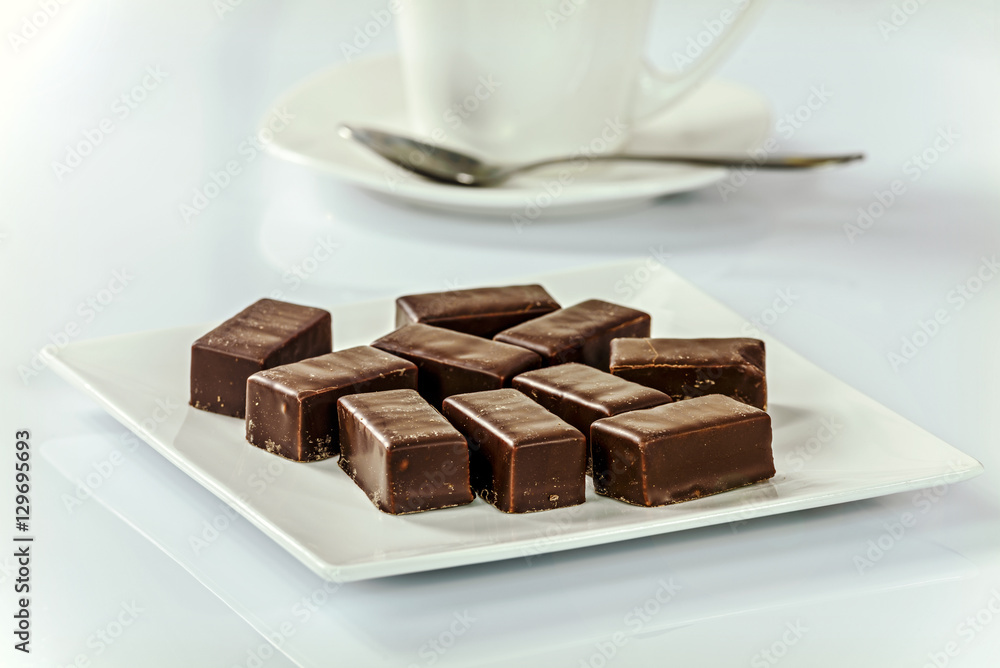 Appetizing chocolates with coffee Appetizing chocolates with coffee