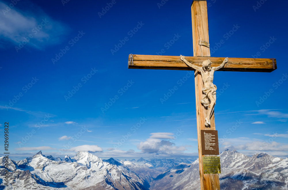 Wood cross with Jesus on Klein Matterhorn Wood cross with Jesus on Klein Matterhorn