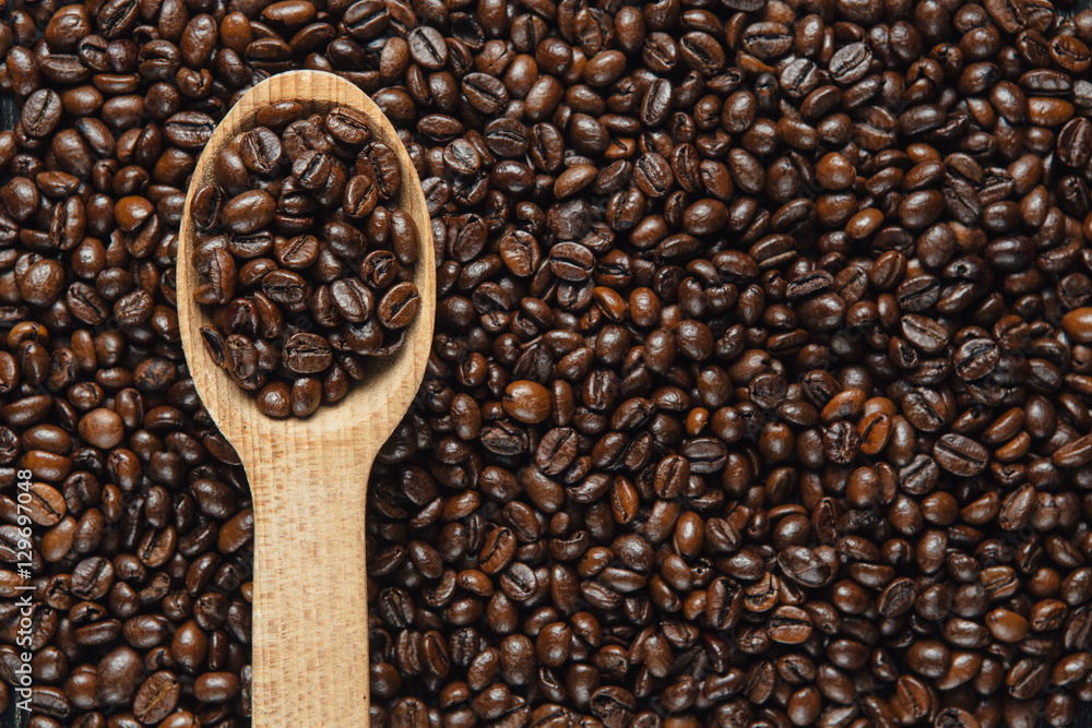Fototapeta premium Coffee Beans in wooden spoon