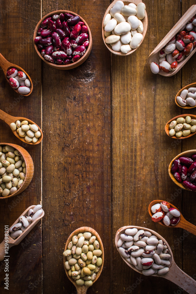 beans on a wooden table beans on a wooden table