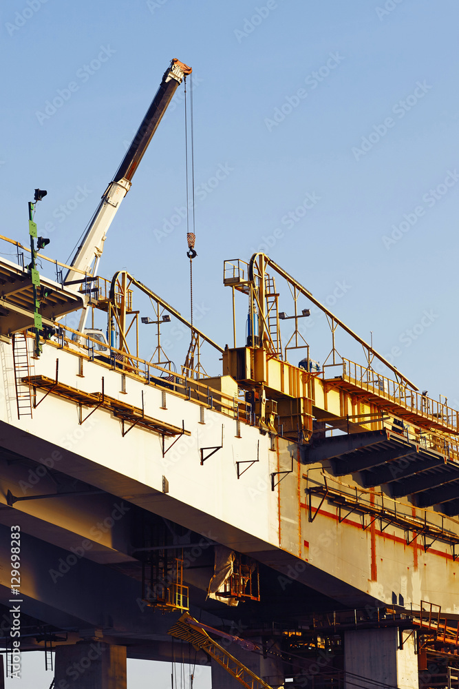 The construction of a new bridge.