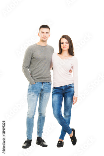 Young and lovely couple isolated on white