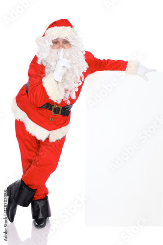 Santa Claus standing isolated on white background. Full length portrait