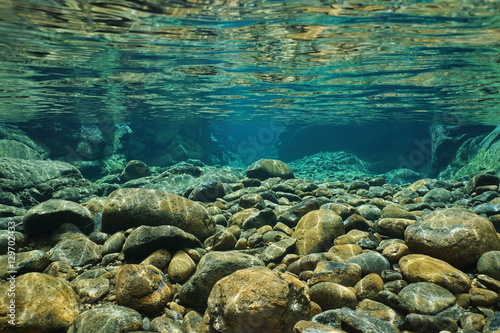 Rocks underwater on riverbed with clear freshwater, Dumbea river, Grande Terre, New Caledonia
