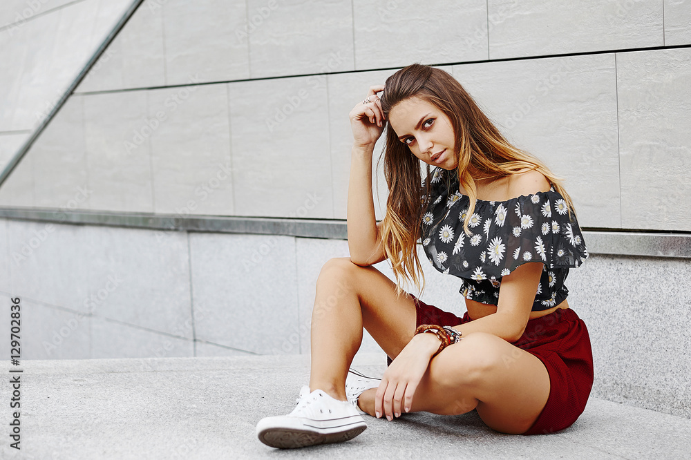Naklejka premium Fashion stylish portrait of pretty young blonde woman