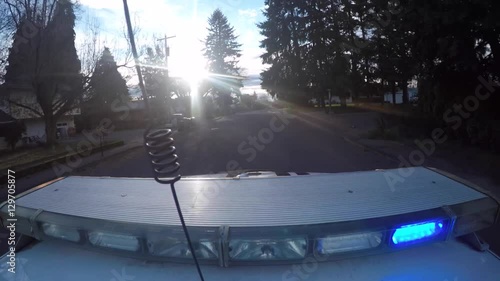 Point of View Police Car Top Lights On Pursuit in Neighborhood at Daytime 1080P 30FPS