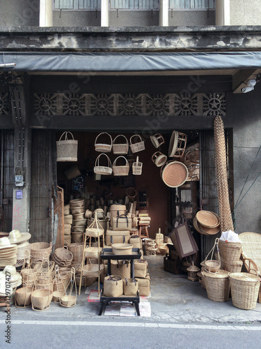 Canvas Print old basketry asian shop on street