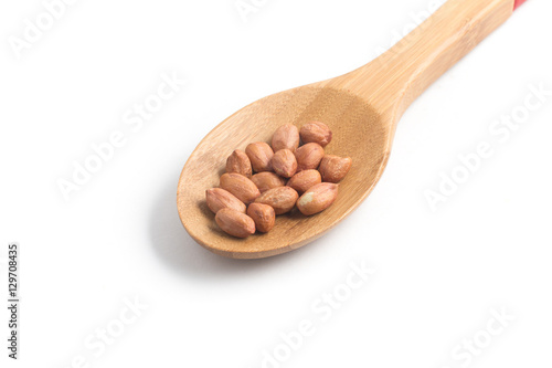 Peanuts pile. Shell Seeds into a spoon