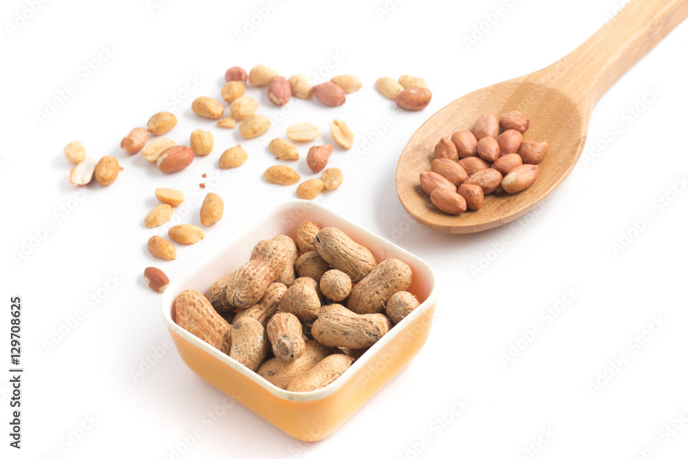 Peanuts pile. Shell Seeds into a spoon Peanuts pile. Shell Seeds into a spoon