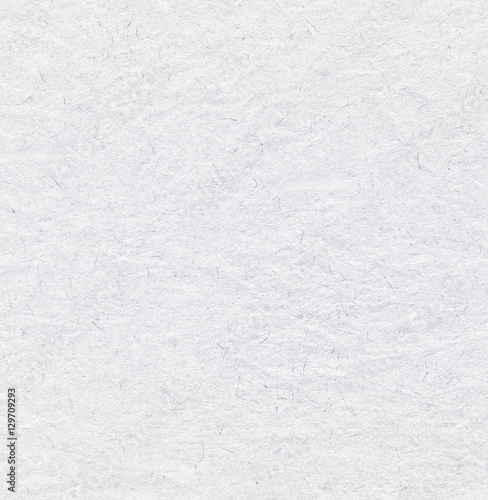Recycled grainy off white paper texture background 