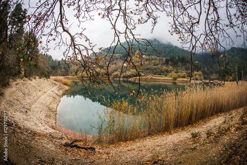 Autumn landscape with green waters of lake Tsivlos, Peloponnese, photo