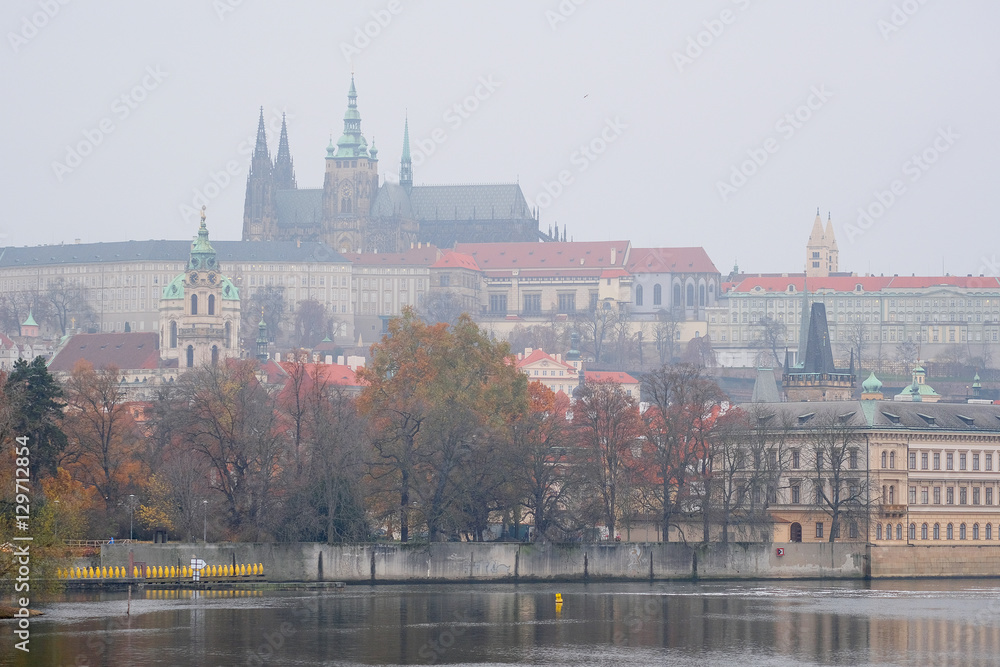 Obraz premium Panorama of an old Prague, bridges and embankment of Vitava river, Czechia