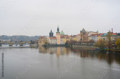 Prague, Czechia - November, 24, 2016: Panorama of an old Prague, bridges and embankment of Vitava river, Czechia
