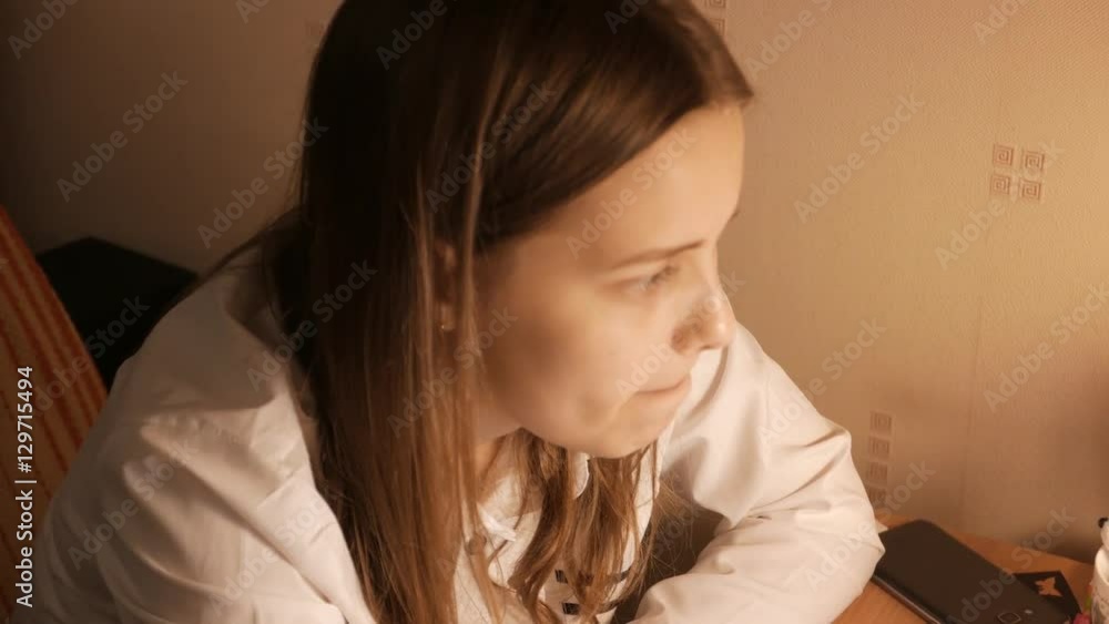 Teenage girl studying with unhappy face. 4K UHD Teenage girl studying with unhappy face. 4K UHD