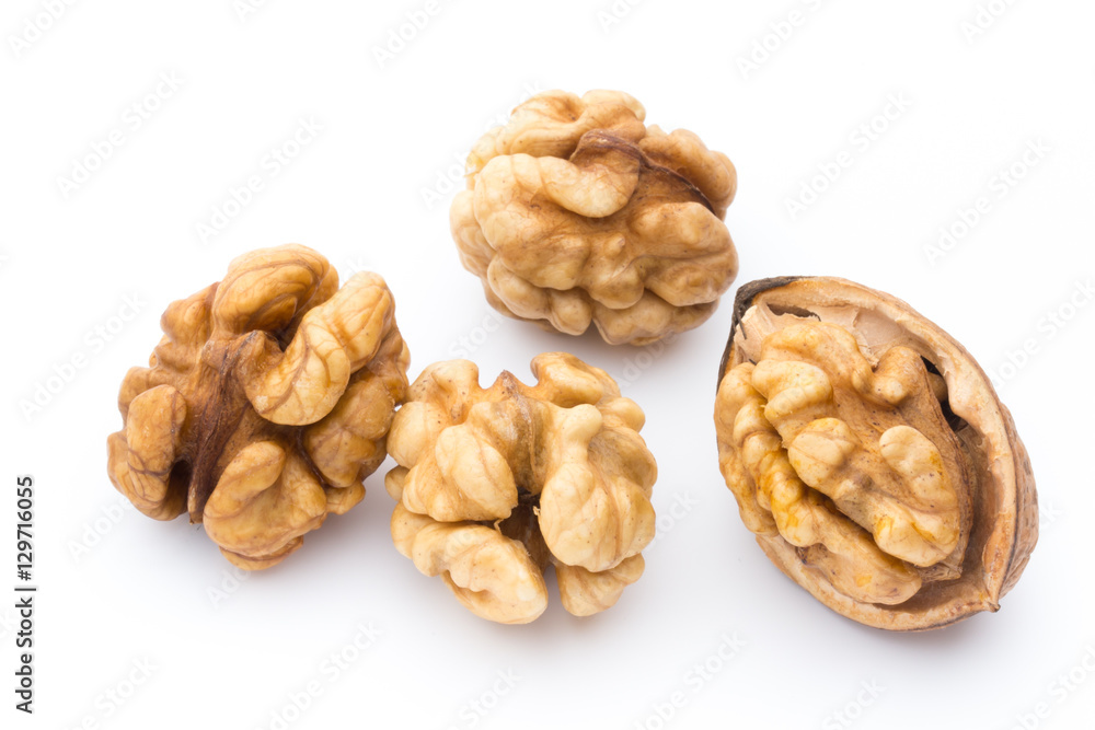 Walnut and walnut kernel isolated on the white background. Walnut and walnut kernel isolated on the white background.