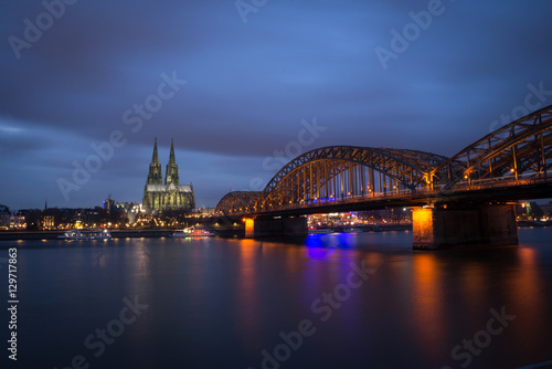 Cologne Cathedral and Hohenzollern Bridge at sunset / nighttime