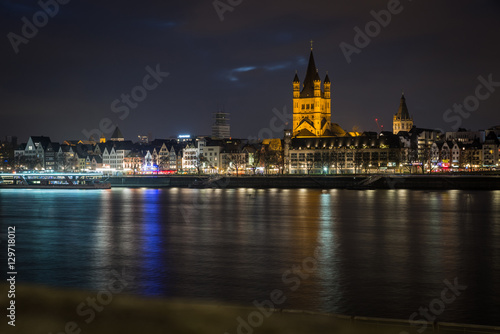 Cologne Cathedral and Hohenzollern Bridge at sunset   nighttime