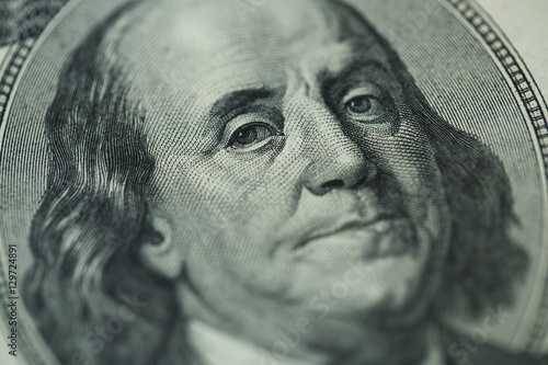 Benjamin Franklin's portrait on one hundred dollar bill