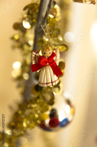 Christmas ornaments with garland and little angel made of straw