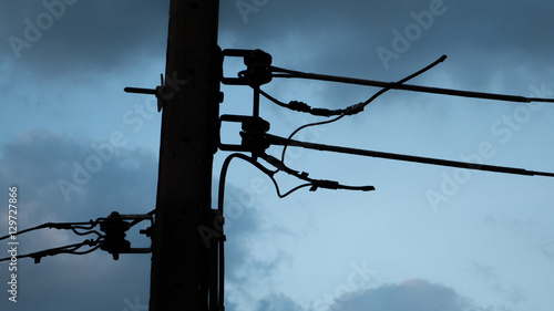 silhouette electricity post