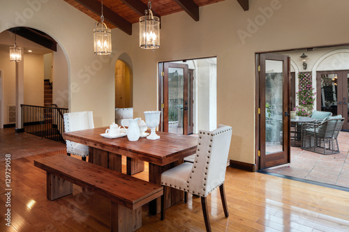 Принти на полотні Table and open french doors in dark wood  n mediterranean style