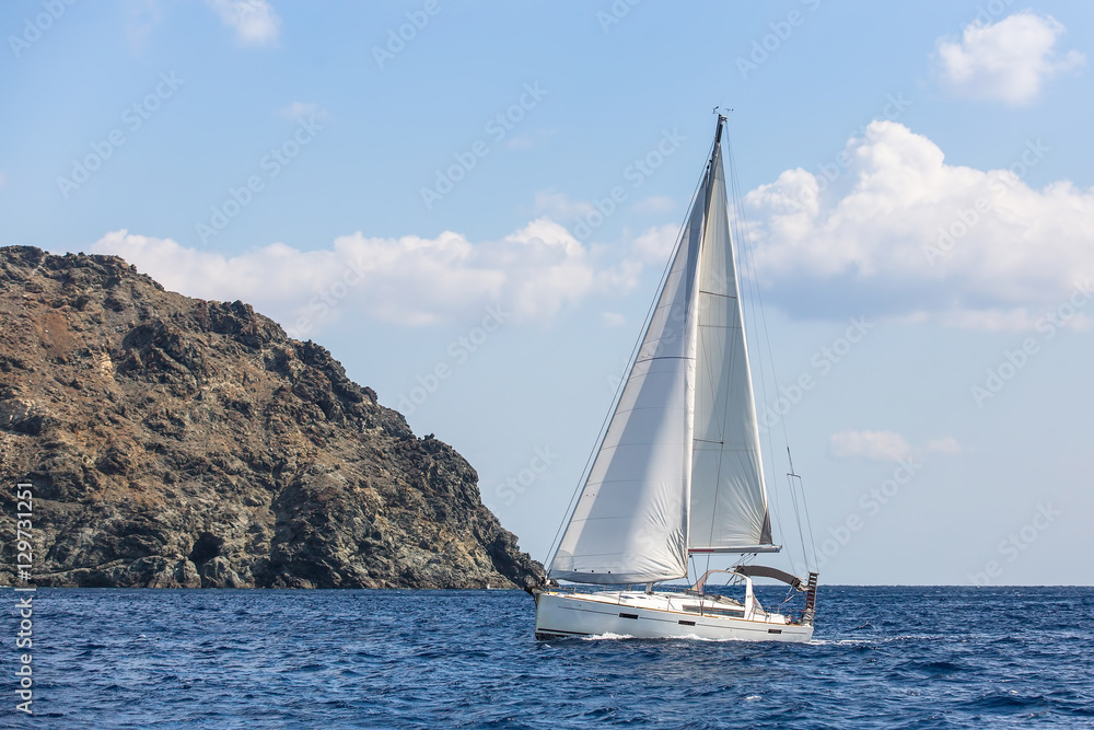 Boats in sailing regatta at Aegean Sea. Luxury yachts.