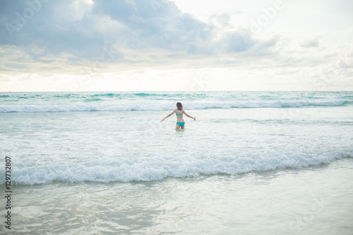 a lady running at the paradise beach horizontal © loliloop