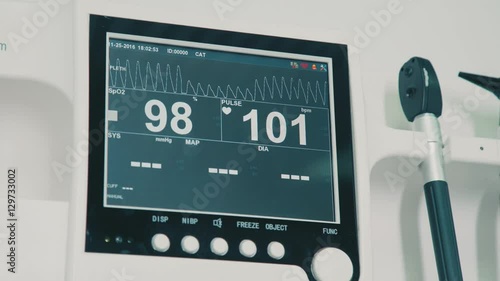 Monitor vital signs in a veterinary hospital: pulse and animal pressure. Monitor the pulse oximeter. Oygen saturation monitor photo