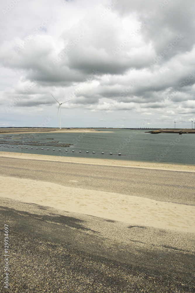 Seaside view with power windmills, Haringvliet, The Netherlands