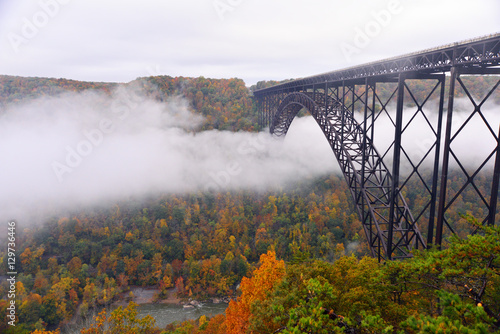 Canvas Print Fog in the morning going under the New River Gorge Bridge